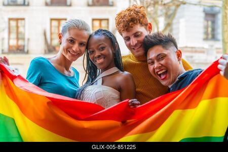 Lgtb couples of lesbian gay boys and girls in a portrait with rainbow flag-stock-foto