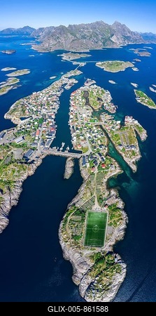 Aerial view, Henningsvaer with football stadium, rock islands in the sea off Bergen, Festvågtinden, Vestvågøy, Lofoten, Nordland, Norway-stock-foto