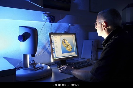 Dental laboratory, manufacture of a dental prostheses by a master craftsman, computer aided design for dental technology, constructing a dental bridge as a virtual model, the original cast is scanned, and after working on the computer, manufactured in a milling machine from a blank-stock-foto