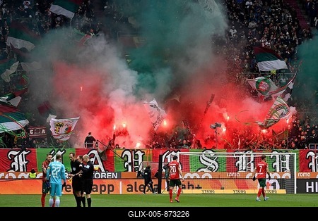 Bengalos, pyrotechnics, fireworks in front of Bundesliga match, WWK Arena, Augsburg, Bavaria, Germany-stock-foto