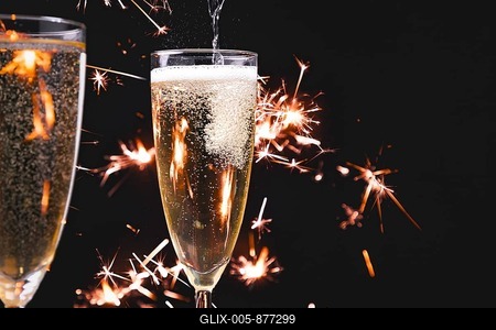 Two champagne glasses, pouring champagne, fireworks, dark background, copy room-stock-foto