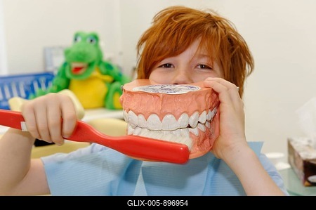 Boy at the dentist's, receiving instructions for dental care on a model, dental hygiene, dental care, dental visit-stock-foto