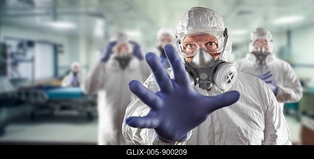 Team of female and male doctors or nurses wearing personal protective equipment in hospital emergency room-stock-foto