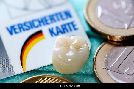 Insurance card, crown and one euro coins, symbolic image for closer monitoring of dentists' invoices by health insurance companies-stock-foto