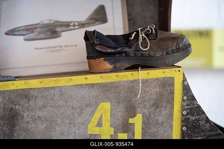 Wooden shoe of a forced labourer stands on aircraft wing, documentation centre in the old Engelberg tunnel, first motorway tunnel in Germany, 1944 and 1945 production site for wings, Messerschmitt Me 262 fighter aircraft, forced labour, station on the path of remembrance, Leonberg concentration camp memorial, Leonberg, Baden-Württemberg-stock-foto