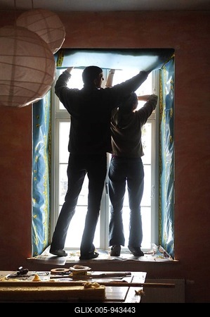 Two young people renovating a room in an old farmhouse, Othenstorf, Mecklenburg-Western Pomerania, Germany, Europe-stock-foto