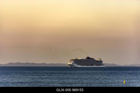 Luxury cruise ship arriving in the city of Salvador in Bahia during summer sunset, Brasil-stock-foto