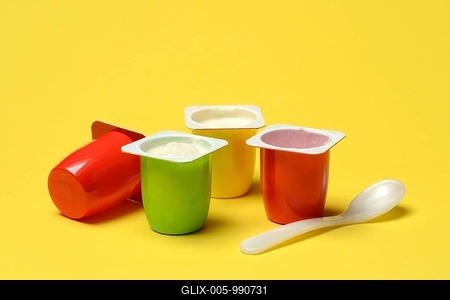 Colourful cups with fruit yoghurt for children, Fruchtzwerge-stock-foto