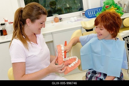 Boy at the dentist's, receiving instructions for dental care on a model, dental hygiene, dental care, dental visit-stock-foto