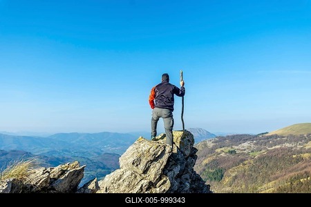A man on the top of Mount Ernio or Hernio in Gipuzkoa at sunset, Basque Country-stock-foto