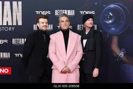 Jonno Davies, Robbie Williams und Michael Gracey-stock-foto