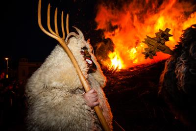 MOHACS, HUNGARY - FEBRUARY 17: Unidentified people in mask participants at the Mohacsi Busojaras, it is a carnival for spring greetings) February 17, 2015 in Mohacs, Hungary.-stock-photo