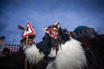 MOHACS, HUNGARY - FEBRUARY 17: Unidentified people in mask participants at the Mohacsi Busojaras, it is a carnival for spring greetings) February 17, 2015 in Mohacs, Hungary.-stock-photo