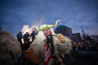 MOHACS, HUNGARY - FEBRUARY 17: Unidentified people in mask participants at the Mohacsi Busojaras, it is a carnival for spring greetings) February 17, 2015 in Mohacs, Hungary.-stock-photo