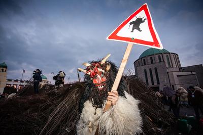 MOHACS, HUNGARY - FEBRUARY 17: Unidentified people in mask participants at the Mohacsi Busojaras, it is a carnival for spring greetings) February 17, 2015 in Mohacs, Hungary.-stock-photo