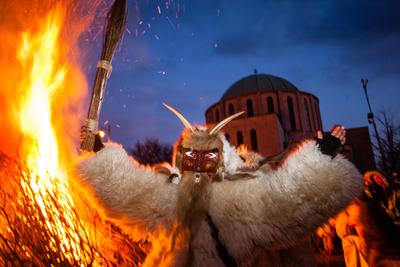 MOHACS, HUNGARY - FEBRUARY 17: Unidentified people in mask participants at the Mohacsi Busojaras, it is a carnival for spring greetings) February 17, 2015 in Mohacs, Hungary.-stock-photo