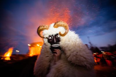 MOHACS, HUNGARY - FEBRUARY 17: Unidentified people in mask participants at the Mohacsi Busojaras, it is a carnival for spring greetings) February 17, 2015 in Mohacs, Hungary.-stock-photo