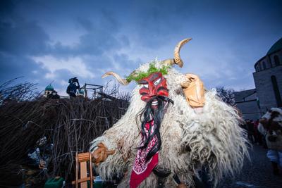 MOHACS, HUNGARY - FEBRUARY 17: Unidentified people in mask participants at the Mohacsi Busojaras, it is a carnival for spring greetings) February 17, 2015 in Mohacs, Hungary.-stock-photo