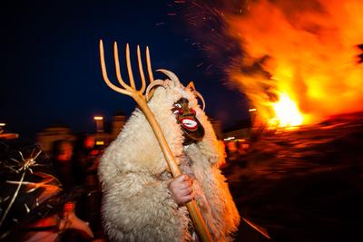 MOHACS, HUNGARY - FEBRUARY 17: Unidentified people in mask participants at the Mohacsi Busojaras, it is a carnival for spring greetings) February 17, 2015 in Mohacs, Hungary.-stock-photo