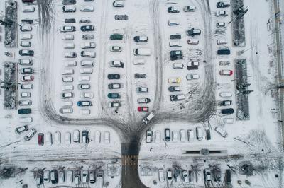 rows of parked cars covered with snow-stock-photo