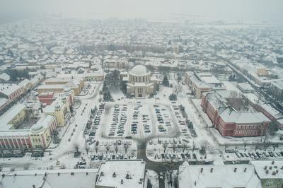 Churc in Mohacs main squere with snow-stock-photo