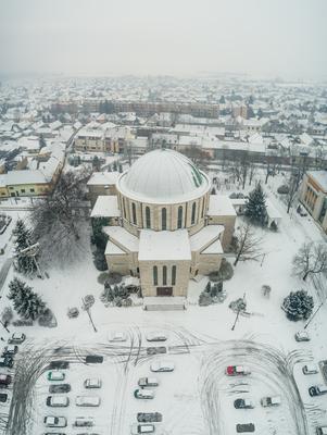 Churc in Mohacs main squere with snow-stock-photo