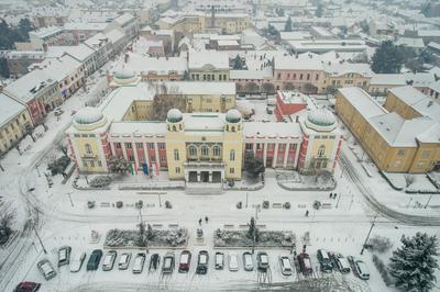 Varoshaza in Mohacs main squere with snow-stock-photo