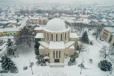 Churc in Mohacs main squere with snow-stock-photo