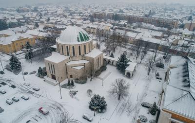 Churc in Mohacs main squere with snow-stock-photo