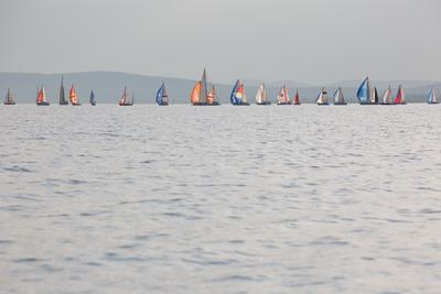 SZANTOD - JULY 18 : Sailing boats compete on 51.th Kekszalag championship at the Lake Balaton on 18 July 2019 in Szantod, Hungary.-stock-foto
