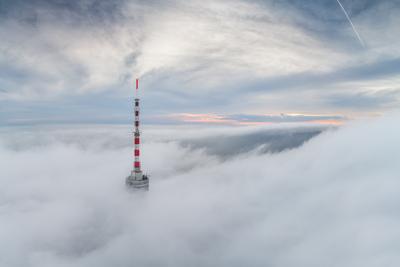 TV tower with cloudy and foggy sky-stock-foto