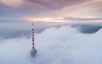 TV tower with cloudy and foggy sky-stock-foto
