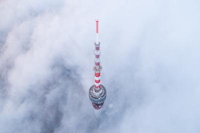 TV tower with cloudy and foggy sky-stock-foto