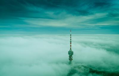 TV tower with cloudy and foggy sky-stock-foto