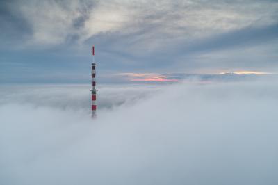 TV tower with cloudy and foggy sky-stock-photo