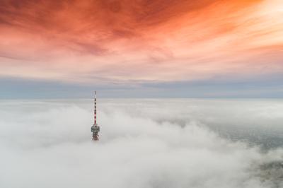 TV tower with cloudy and foggy sky-stock-photo