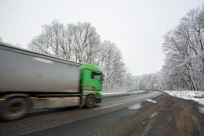 fast car with snowy road at  wintertime-stock-photo