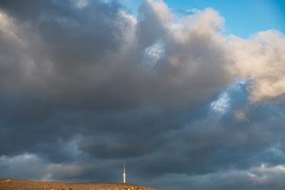 TV tower in Pecs, Hungary with cloudy sky-stock-foto