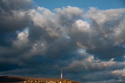 TV tower in Pecs, Hungary with cloudy sky-stock-foto