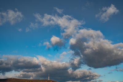 TV tower in Pecs, Hungary with cloudy sky-stock-foto