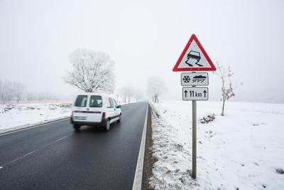 Fast moving van with snowy road-stock-foto
