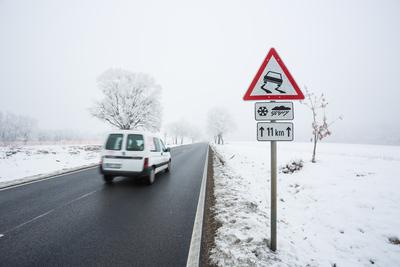 Fast moving van with snowy road-stock-photo