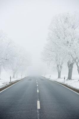 winter warning sign with snow-stock-photo