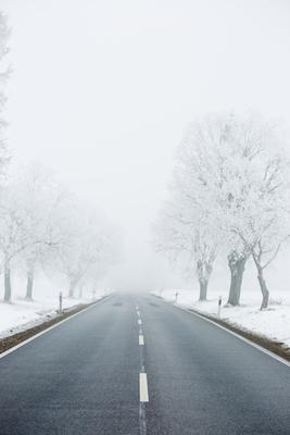 winter warning sign with snow-stock-photo