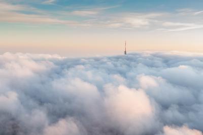 TV tower with cloudy and foggy sky-stock-foto