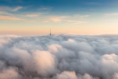 TV tower with cloudy and foggy sky-stock-foto