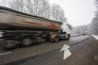 snowy road at cold wintertime-stock-photo