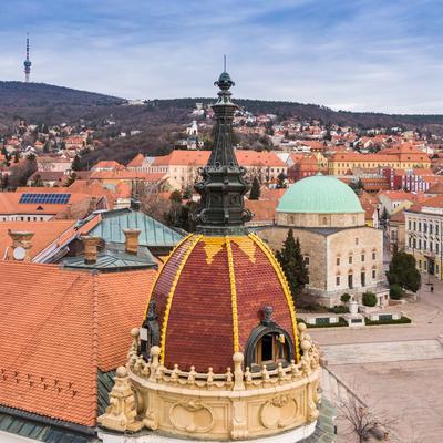 Aerial view of Pecs, Hungary with colorful rooftop of Megyehaza building-stock-photo