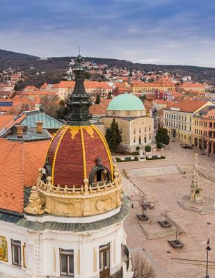 Aerial view of Pecs, Hungary with colorful rooftop of Megyehaza building-stock-photo