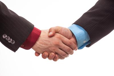 Business handshake in isolated white-stock-photo